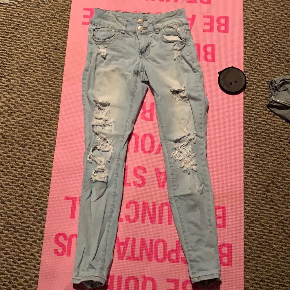 Distressed Rue21 jeans.